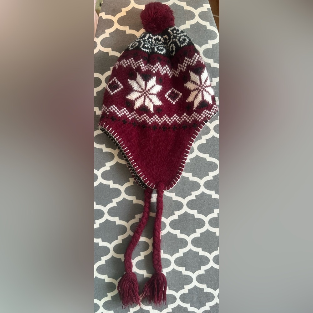 Fleece-lined, winter, pom pom hat. Brand new and never used.
